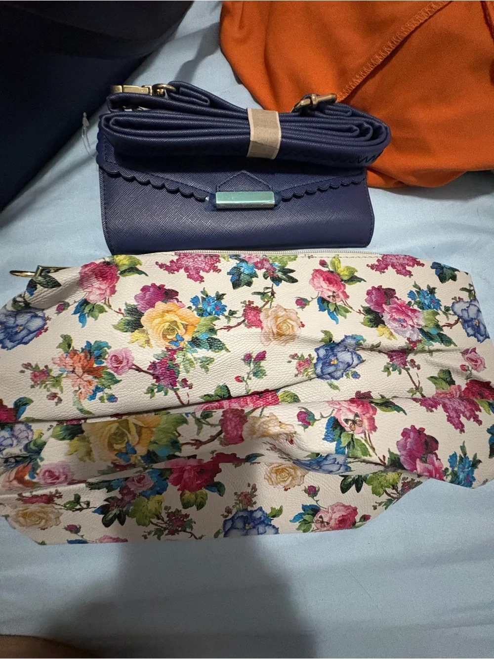 Structured Navy Fashion Tote with Gold Chain Accent and Wallet.